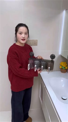 Install a suction cup toothbrush and cup holder next to the sink, and the whole family's toothbrushe