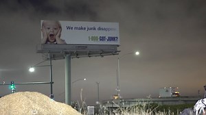 Watch these activists turn this billboard into something incredible! | We Resist