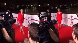 Theresa recycles a slinky red dress for military awards ceremony