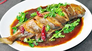 13K views · 197 reactions | A unique #Quanzhou cooking method makes a dish of grilled yellow croaker complete. Its rich taste surprised CGTN hosts Tianran He and Eva May. #FoodWise Travelogue | China Plus Culture | Facebook