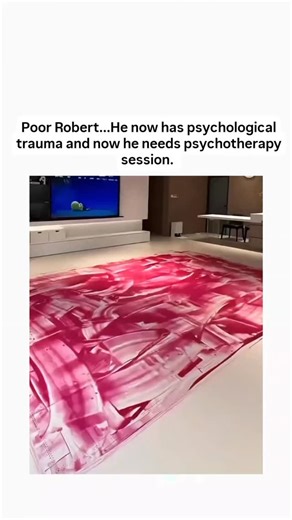Global Reels on Instagram: "The video shows a robot vacuum cleaner dragging pink paint across a white-tiled living room floor, creating chaotic streaks while a cartoon plays on a nearby TV, emphasizing the device's unintended role in worsening the spill. Posted by @kamuideh on January 29, 2026, the clip has drawn 138,000 views and humorous replies, including affiliate links to vacuums and jokes about the robot needing therapy, reflecting its viral appeal on X.Robot vacuums often exacerbate liqui