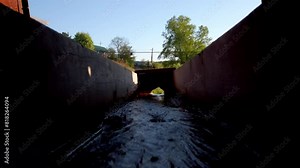 Observing the rear view of a truck from inside its cabin as it moves through traffic.
