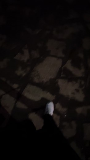 Enchanting Night Views of a Lighthouse by the Waterfront