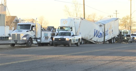 Train crashes into Walmart tractor trailer