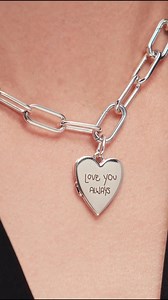 The best gifts don't just sparkle — they speak. ❤️ Drop by our Engraving Bar to engrave special pieces like our openable heart locket. | Pandora Bay Street