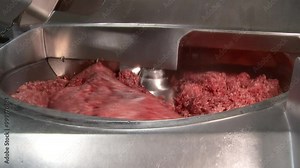 butchering of pork and beef carcasses production of minced meat from pork and beef meat in the stuffing machine of the meat processing plant