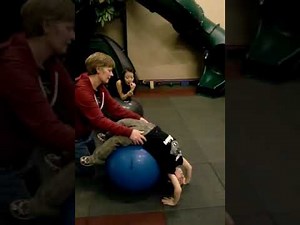 Therapeutic exercises with exercise balls for children