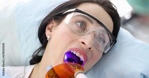 Patient visits dentist for regular checkups and fillings. Installation of dental fillings concept