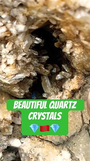 The specimen in the video is a lithophysal cavity or vug hosted within a rhyolitic matrix.