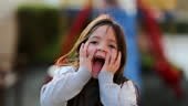 Child shock emotional reaction to camera cute girl screaming with...