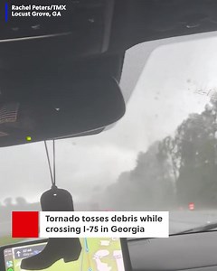 Video shows a tornado crossing Interstate 75 in Georgia, tossing debris and even a beach ball through the air. | FOX19