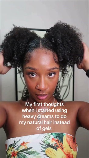 Pattern styling cream on natural hair