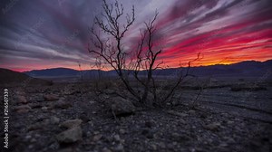 Time lapse of the sunset and clouds at the exit of Titus Canyon in Death Valley National Park, in California
