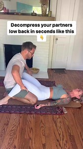 Decompress your partners low back in SECONDS with this simple technique! FOLLOW TO RELAX YOUR BODY! #backpain #backpainrelief #chiropractic #wellness | Moore Wellness