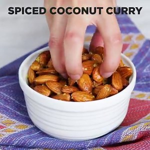 687K views · 1.6K reactions | Coconut Curry Spiced Almonds Recipe in the comments! | Nourish by Tastemade | Facebook