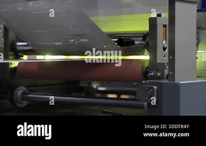 Automated printing. Industrial printing press in action with colorful rollers and sheets moving on automated production line. Modern offset printing technology. High quality mass print manufacturing Stock Video Footage - Alamy