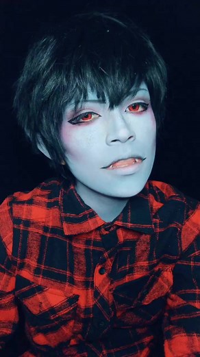 Dynamic Cosplay Visuals in Red and Black