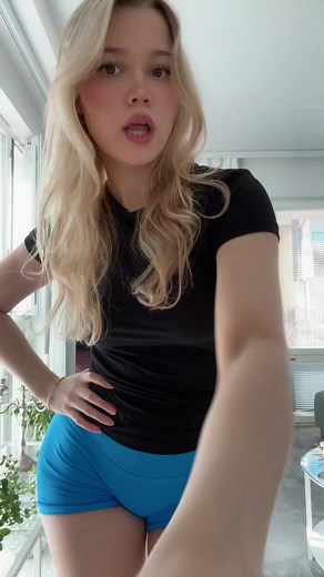 TikTok Dance Moves in a Modern Living Room
