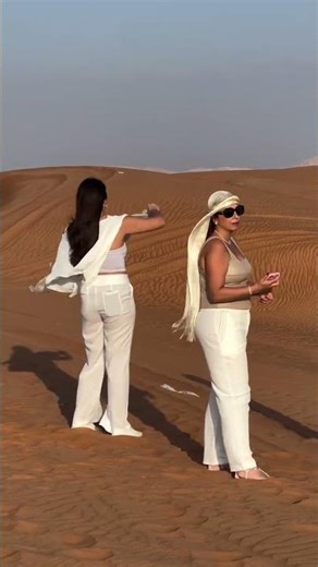 Beautiful woman in desert with dune bashing #dubaiadventure #desertsafari #dunebashing #dubai