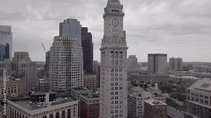 beautiful aerial capture of boston clock tower in the financial district from a drone