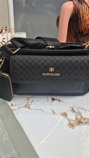 Whispasboutiqueja on Instagram: "Cop this River Island bah with coin wallet attached Cost $13,000"