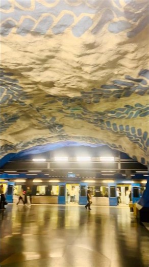 🚈 “At T-Centralen… the central hub where every train line meets underground in blue” 🚆