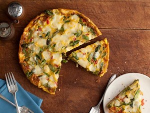 Giada De Laurentiis Makes Her Frittata With Asparagus, Tomatoes and Fontina