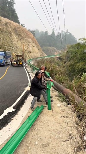 Installing Roadside Guardrails to Improve Mountain Road Safety 🛣️