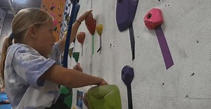 Rock climbing camp empowers kids with limb differences to reach new heights