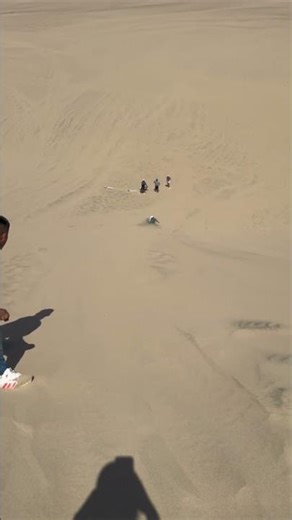 Woman Tumbles Down Steep Huacachina Sand Dune