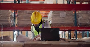 Architecture, man and laptop with blueprint at warehouse planning a building design, layout and project as architect. Logistics, construction and engineering person with idea for property development