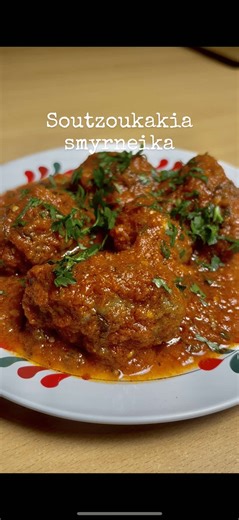 Soutzoukakia Smyrneika, where spices tell history. Ingredients • 500 g mixed minced meat (lamb & beef) • 1 egg • 5 garlic cloves, finely chopped • 100 g bread • Ground cumin • Ground cinnamon • 1 cinnamon stick • Fresh tomato, grated • 1 tbsp tomato paste • 1 tsp sugar • Salt & black pepper • Olive oil • Fresh parsley, chopped • Red wine (for soaking the bread) • Flour (for coating) ⸻ Instructions 1. Soak the bread in red wine and squeeze well. 2. In a bowl, mix the minced meat, egg, soaked brea