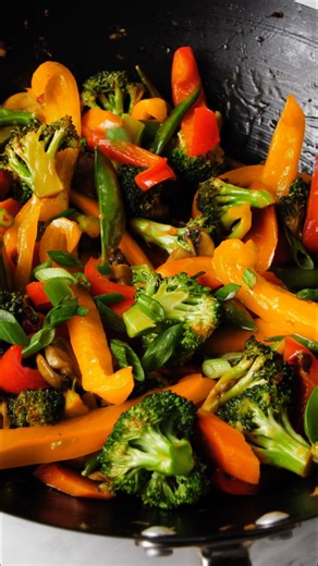 This easy stir fry recipe features colorful veggies in a delicious sweet and savory sauce. Ready in 20 minutes, it's a quick, healthy, and flavorful meal! | Love and Lemons