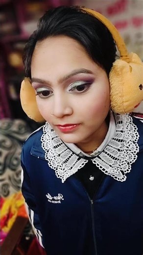 Navy blue eye makeup.