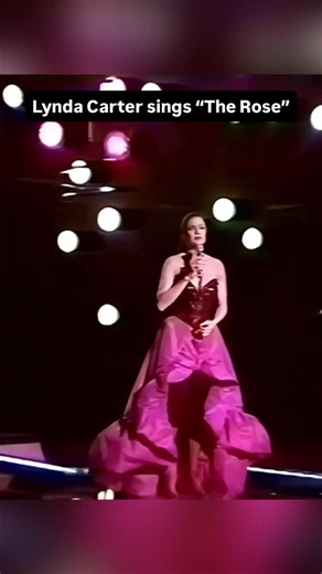 Did you know? 🌹 Back in 1981 on her special ‘Celebration,’ Lynda Carter sang ‘The Rose’ and absolutely nailed it. 🎤✨ Pink bustier, elegant vibes, and a voice to match—who else knew she could sing this well? Let me know if this surprises you! 😉 #lyndacarter #wonderwoman #80smusic #therose #oldiebutgoodie #vintagemusic #retromusic #slowmusic #romanticsong #lovesong | Lynda Carter Everything