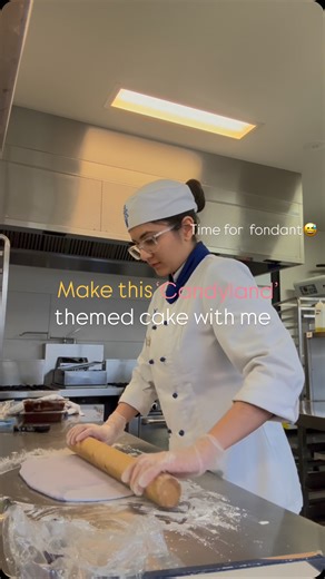 Avni on Instagram: "Here is my interpretation of a candyland themed cake which features lollipops, macarons, toffees, candy floss, sprinkles, and a mini cake with mini lollipops😂 Attempt 1 at fondant. Wouldn’t say I would want to do it again tbh😪 #lecordonbleu #lecordonbleuaustralia #melbourne #fondant #cakedecorating #cakedecorater #cakeartist #candy #candyland #cake #mudcake #chocolatecake #pastry #decorate #sugar"