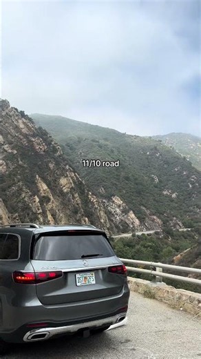 Perfect road in the perfect road trip car | #mountains #roadtrip #Hiking
