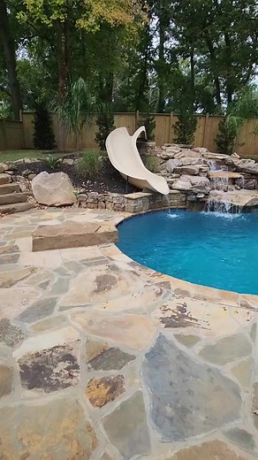 Stunning Freeform Pool with Waterfall and Spa Features