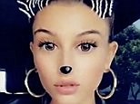 Hailey Baldwin lip syncs in the car to show off her outfit