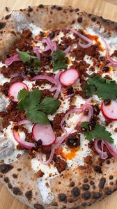 We teamed up with Masienda to create a blue corn masa pizza that tastes as delicious as it looks. We topped ours with classic Mexican flavors: creamy Oaxaca cheese, rich & spicy chorizo, bright pickled onions, cilantro and guajillo chile salsa macha. Grab the dough recipe below: BLUE CORN MASA PIZZA DOUGH: 320 grams water 1 gram active dry yeast 400 grams AP flour 100 grams @masienda blue corn masa harina 15 grams salt 10 grams olive oil 1. Add the yeast to the water and whisk to combine. 2. Com