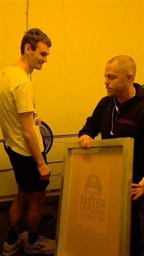 A look behind the scenes here at Custom T-Shirts Ink. Burning screens with Master Billy and young Dante. | Custom T-shirts Ink