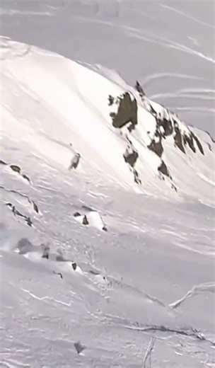 6359:Skier tumbles like spinning wheel down slope in Chinese resort