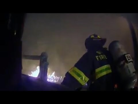 Firefighter's helmet cameras capture dramatic rescue