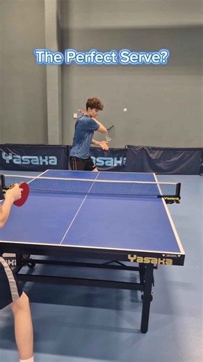 Ping Pong player demonstrates the perfect serve!