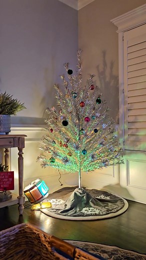 I got this antique aluminum Christmas tree for my wife a few years ago. My grandma had one just like this and I still remember helping her set it up! Let's set it up! ##ohchristmastree🎄 #aluminumchristmastree #antiquechristmastree #colorwheel #christmasdecorating #nestolgic #montgomeryward #kansascity #fypシ #fyp