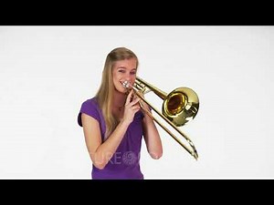 Woman Model In Studio With White Background Playing Trombone