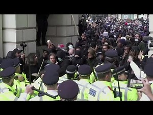 UK protesters face off with police