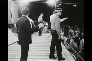 Fans storm stage during Robin Gibb's performance, police remove them 1970 | NIGHT FEVER