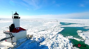 3.2K views · 126 reactions | Stunning Ice Build Up Around Michigan City Lighthouse 2018 | Timeless Aerial Photography | Facebook