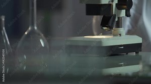 Lab scientist researching food on presence of genetically modified organisms